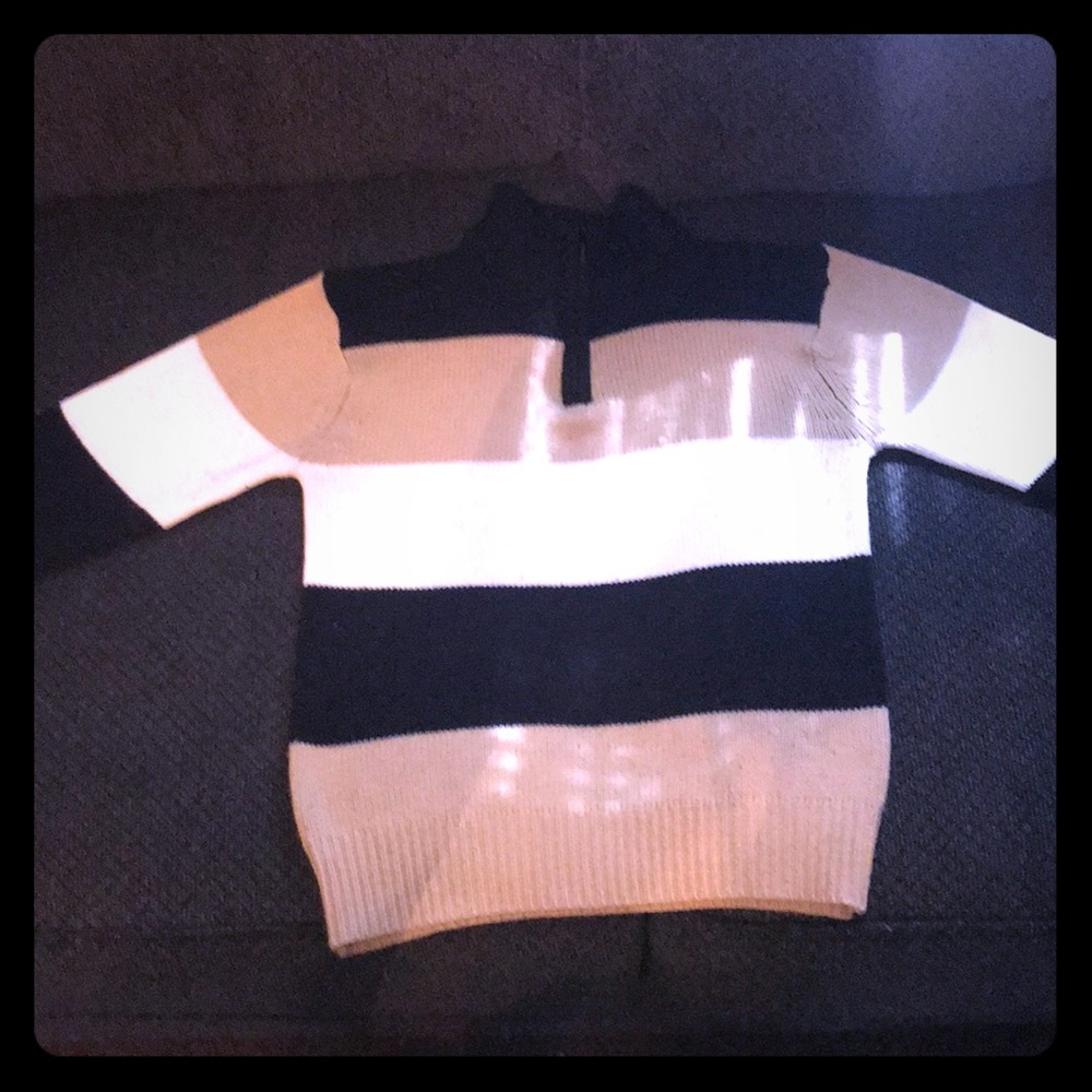 Zip up black white and tan sweater